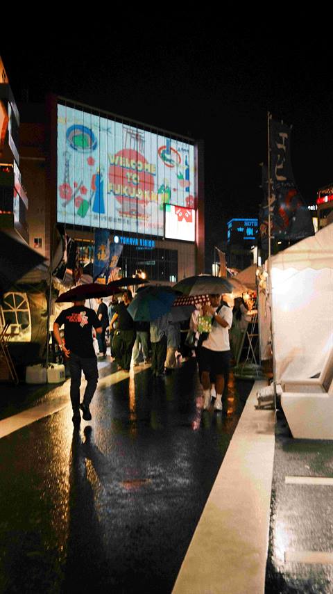 Yatai food stalls lit up at night in Fukuoka