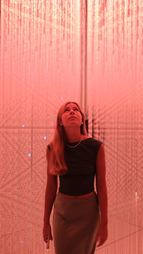 Maria inside TeamLab Borderless red room