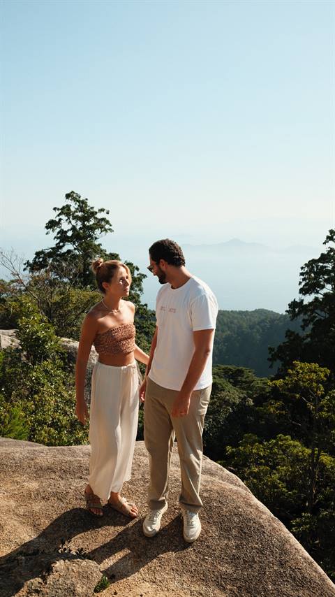 Couple hiking at a mountain viewpoint near Tokyo