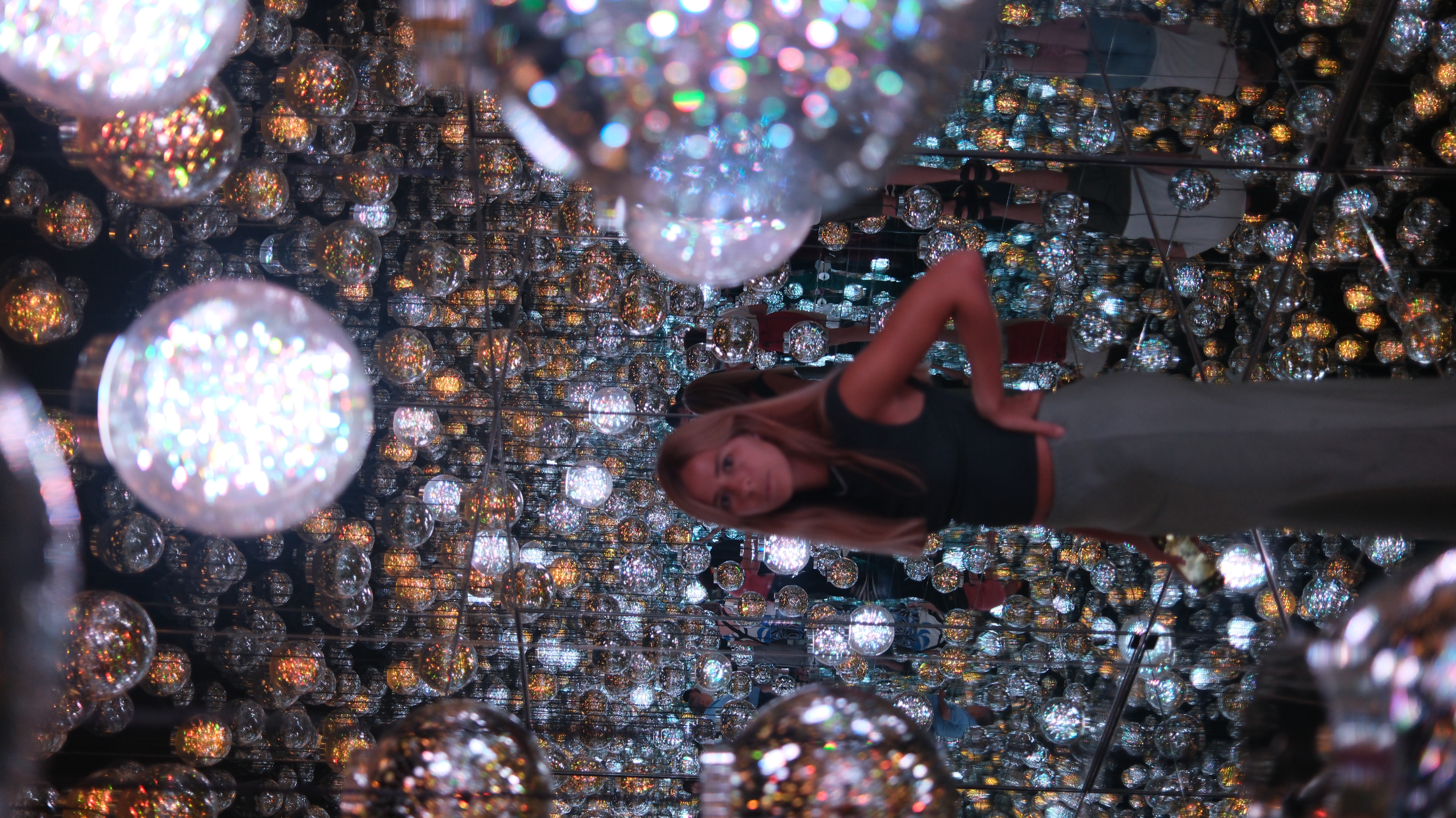Maria inside TeamLab Borderless mirror ball installation, Tokyo