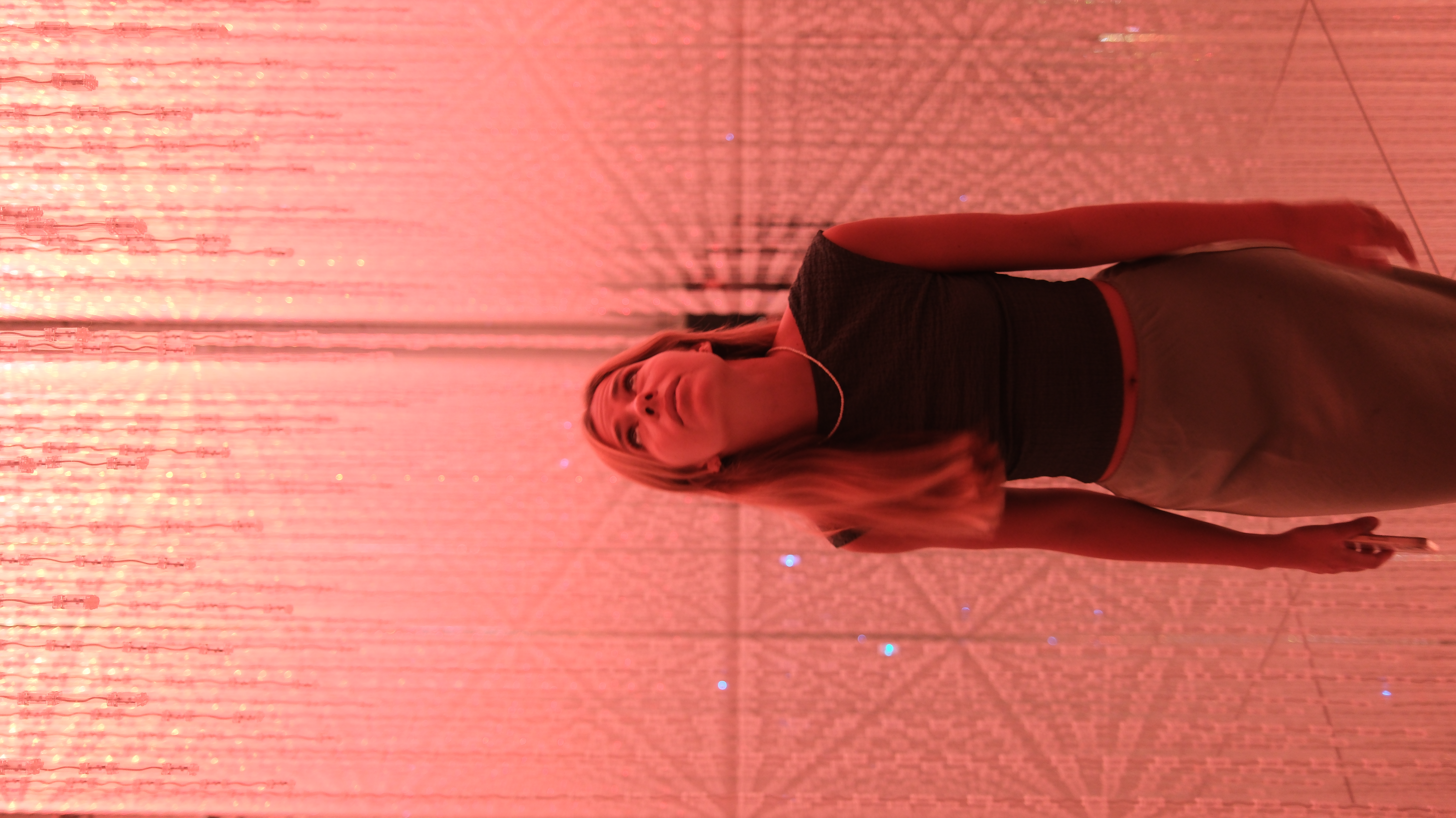 Maria inside TeamLab Borderless red light installation, Tokyo