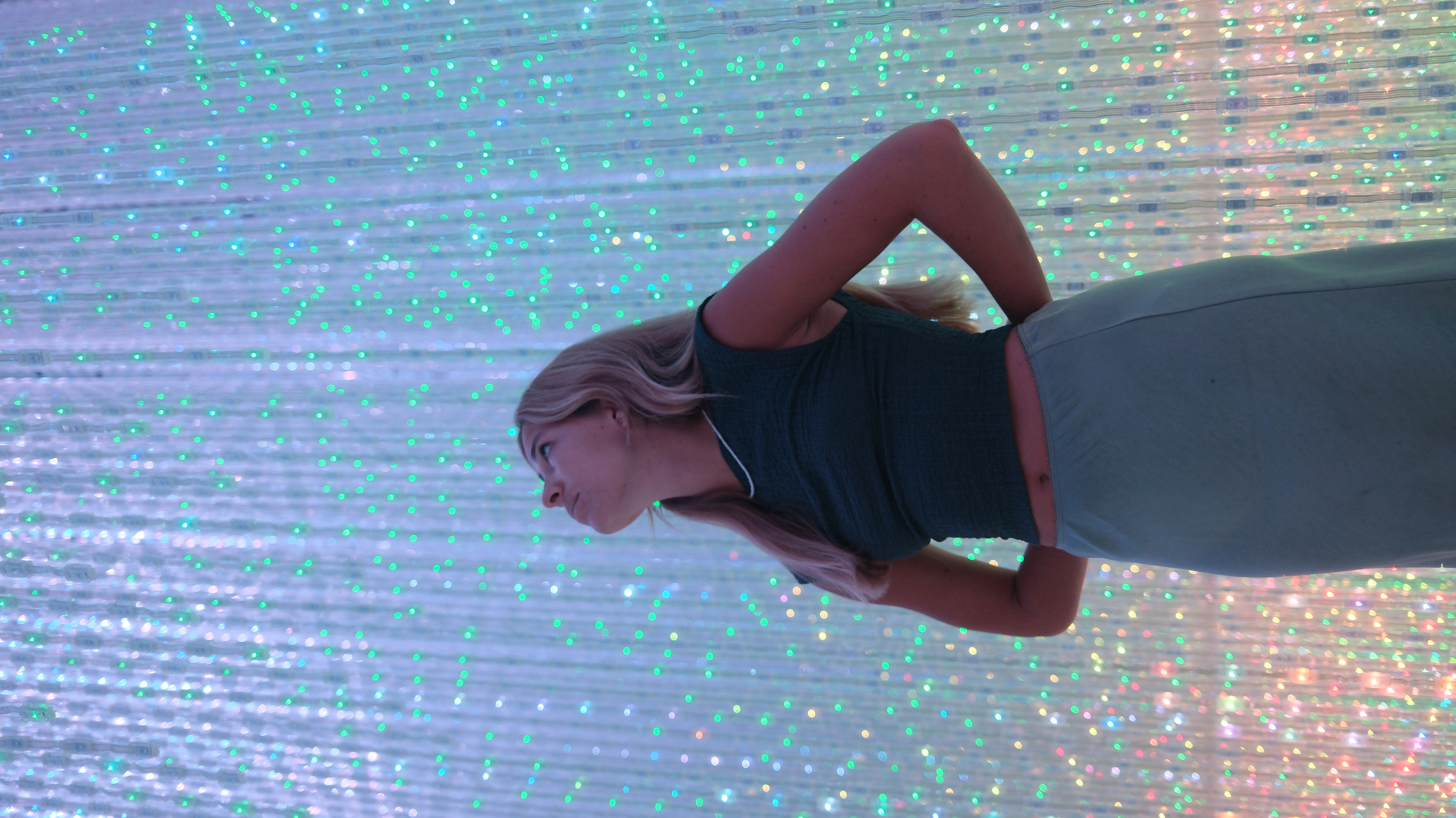Maria inside TeamLab Borderless multicolour sparkle installation, Tokyo