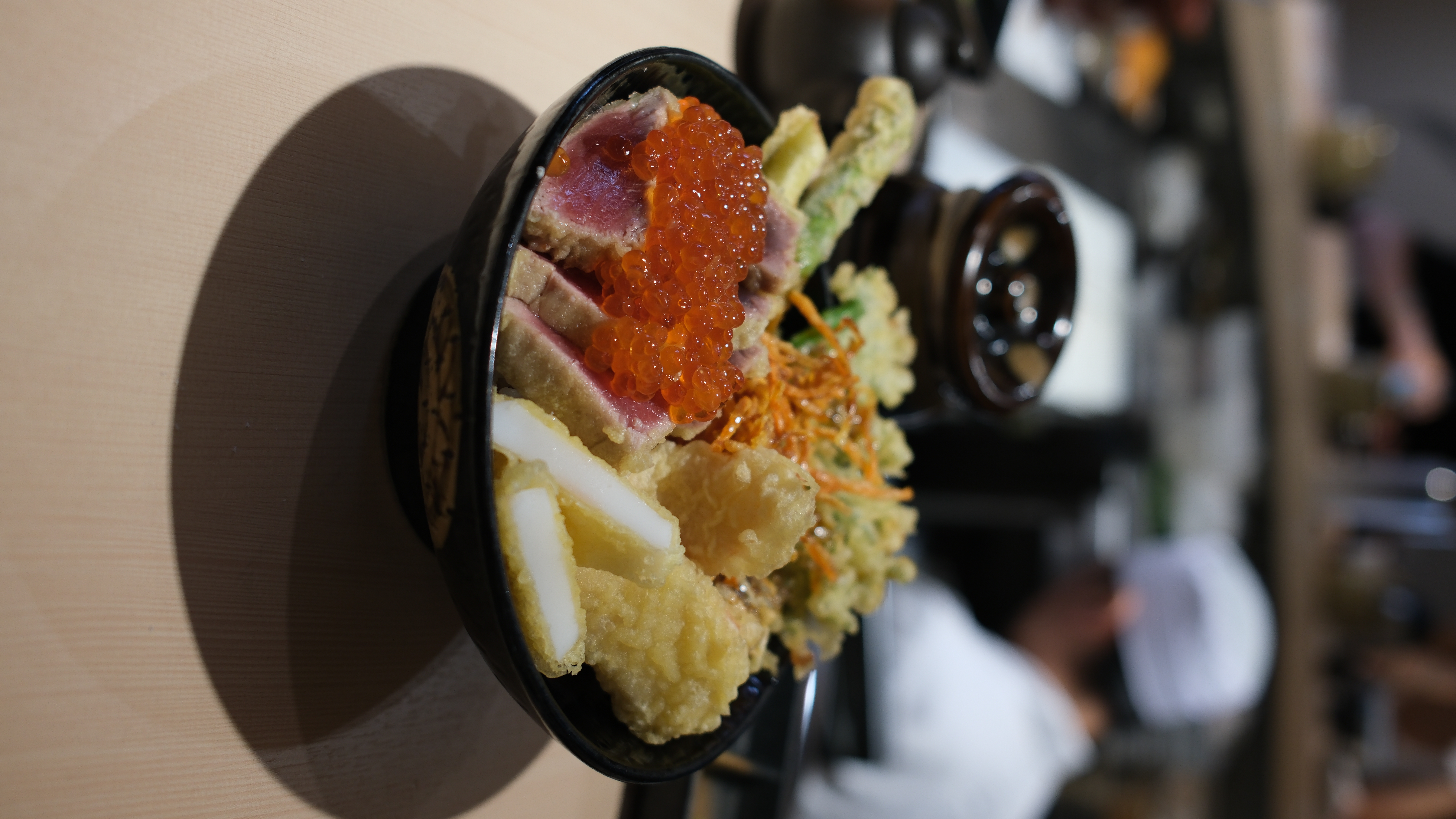 Tuna tataki and tempura donburi food bowl at a Tokyo restaurant