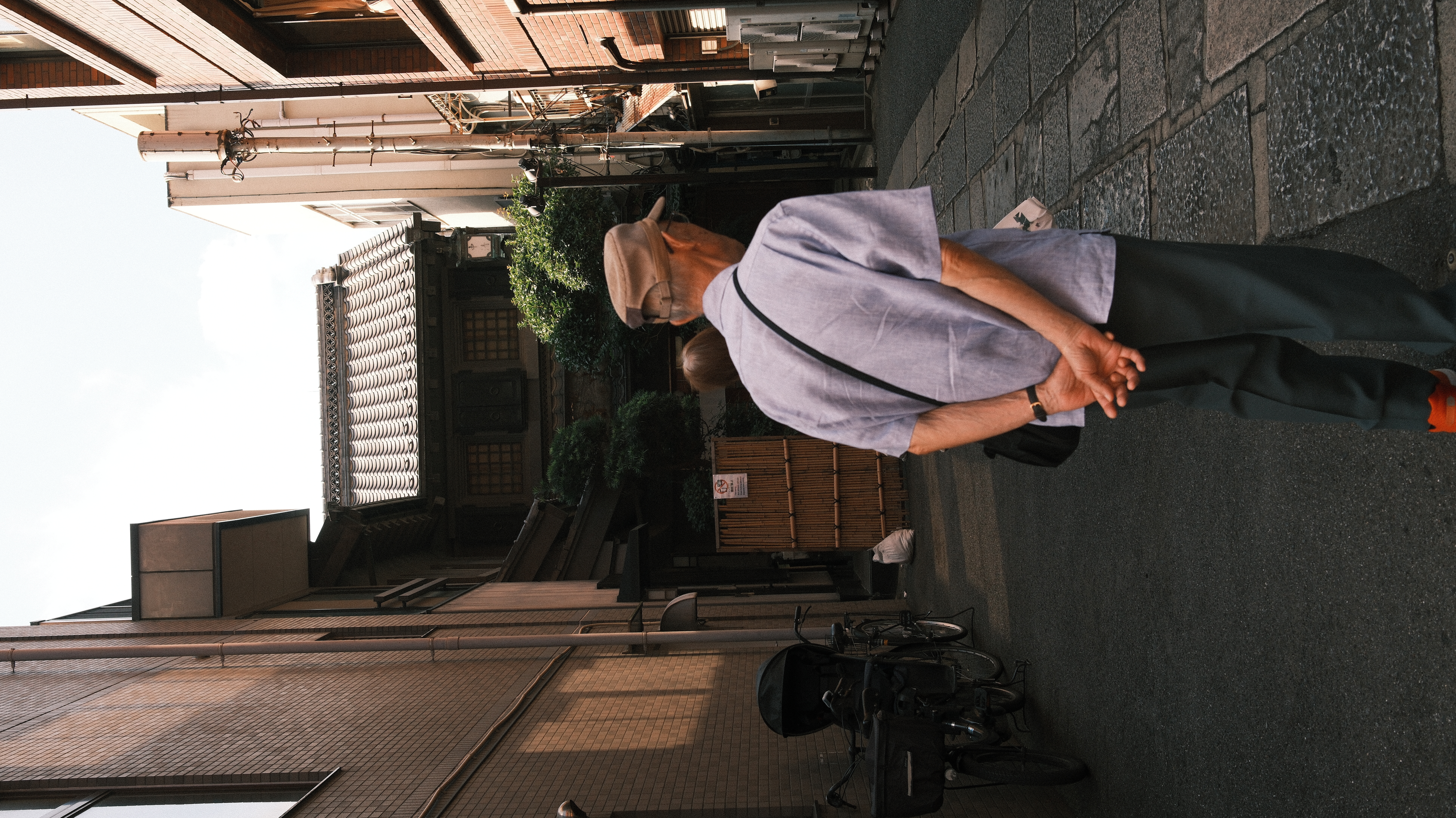 Elderly Japanese man on a Tokyo street, candid