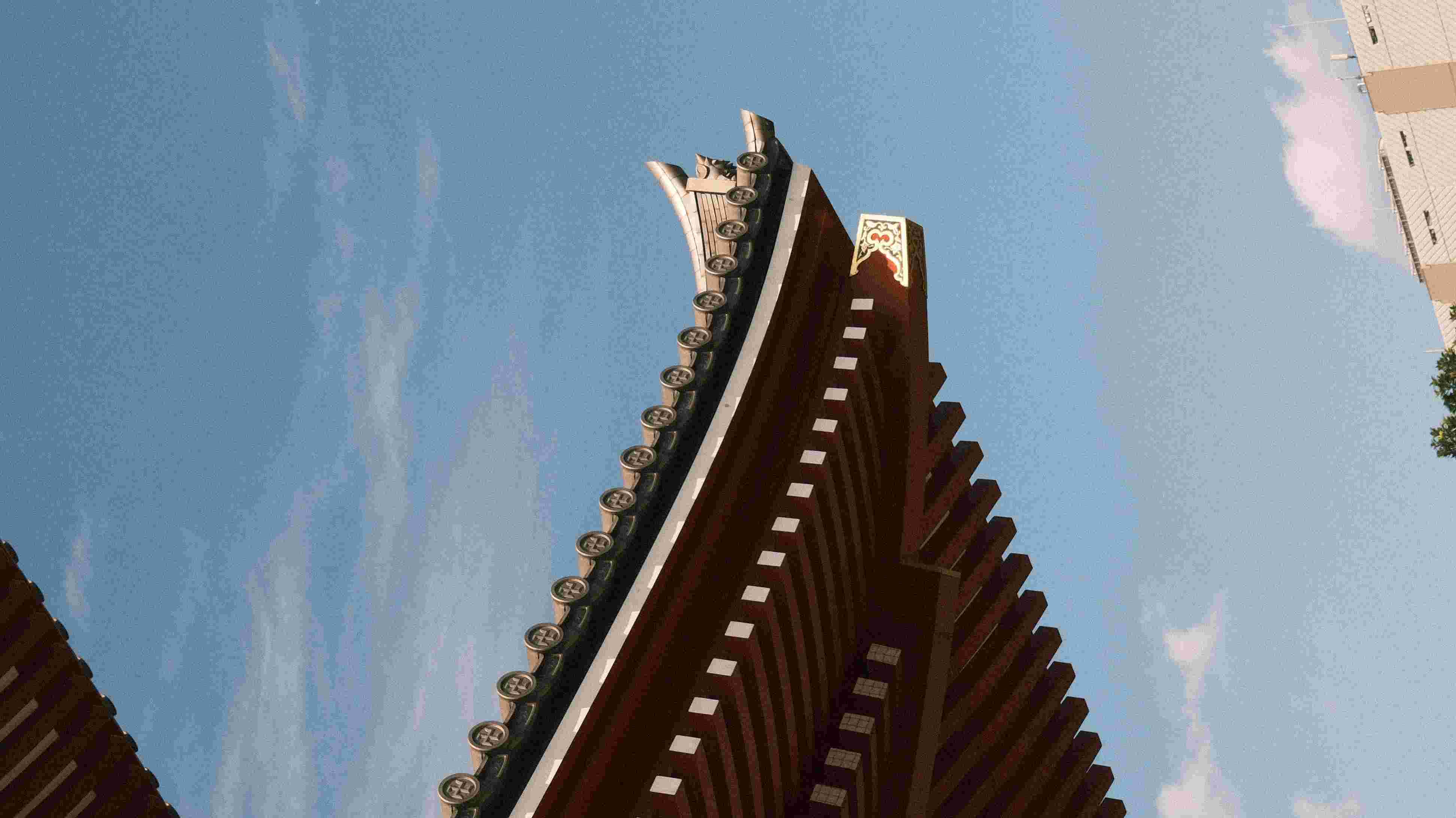 Sensō-ji temple roof eave against blue sky, Asakusa Tokyo