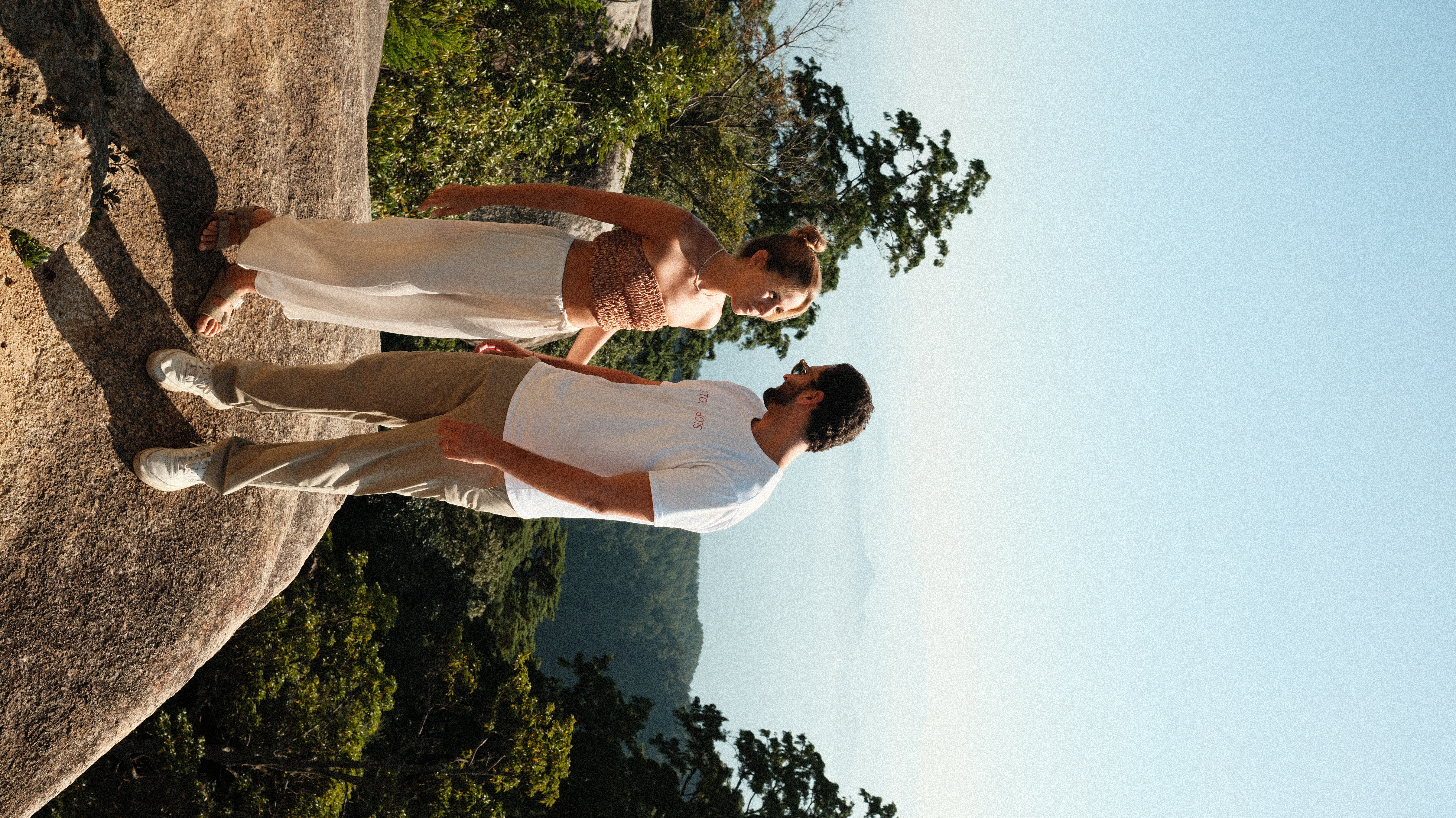 Maria and Zé hiking at a mountain viewpoint in Japan